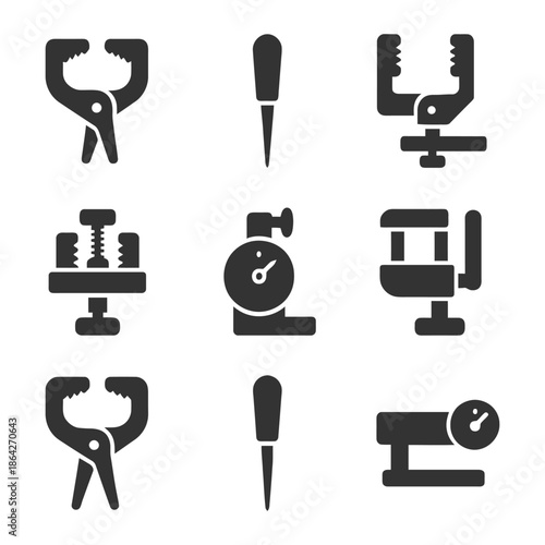 Set of various clamps and tools silhouettes for workshop use.