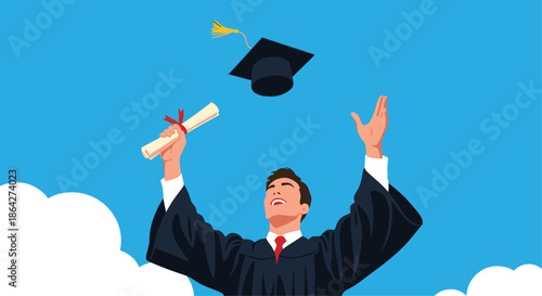Joyful graduate in a black gown and red tie throwing his mortarboard cap into the blue sky while holding his diploma scroll.