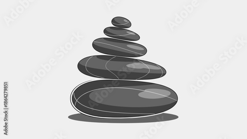 Stack of smooth dark grey balanced stones for spa.