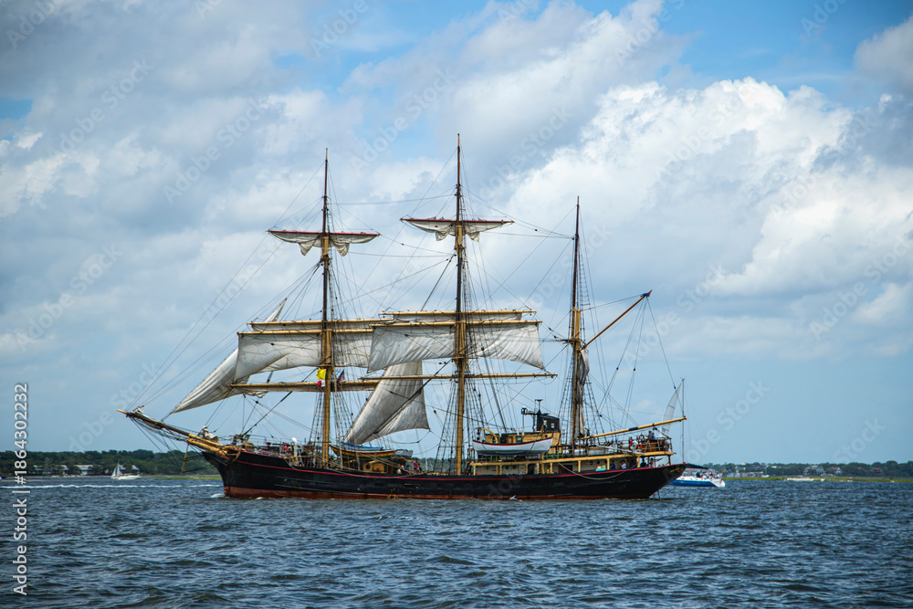 Fototapeta premium Tall ship sailing on open coastal water