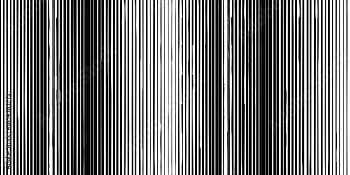 Abstract grayscale image featuring closely spaced vertical lines and subtle light variations