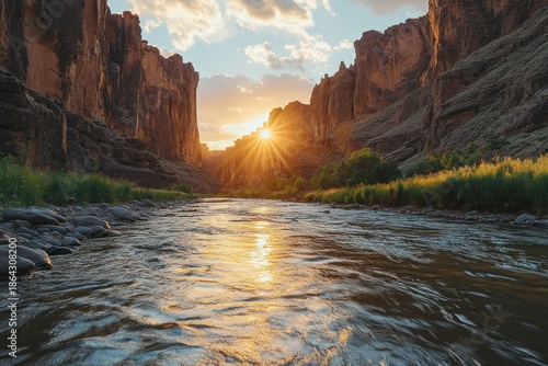 Golden Hour Glow - River Flowing Through Majestic Canyon Walls.