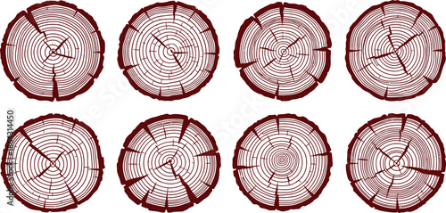Eight brown tree stump cross sections with concentric rings and radial lines