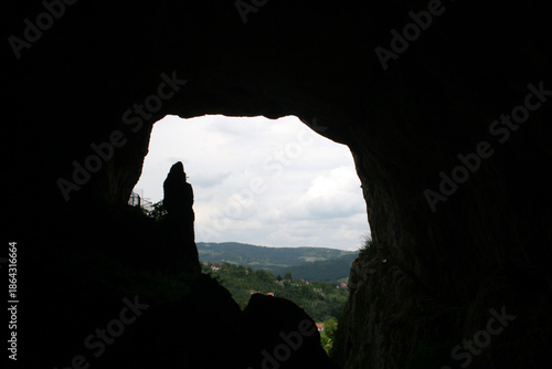 Attractive Potpecka Cave, a natural monument located in the village of Potpece, 14 km southeast of Užice, Serbia. Its gigantic portal, 50 meters high, is the largest cave entrance in the Balkans.