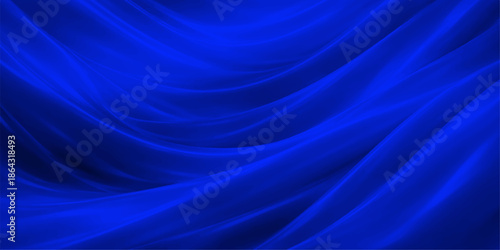 Smooth flowing blue silk and satin fabric background featuring luxury wavy texture and shiny light motion design on soft textile material wallpaper