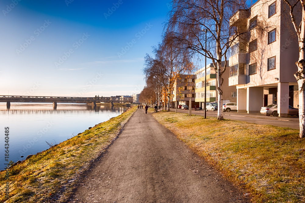 Fototapeta premium Bank of Kemijoki River in the city of Rovaniemi. Lapland, Finland. HDR.