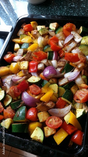 Wallpaper Mural Diced colorful vegetables roasting on baking tray, healthy meal preparation Torontodigital.ca