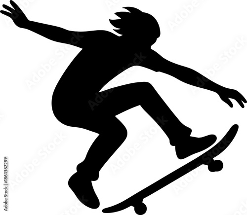 Silhouette of a skateboarder performing a trick on a skateboard