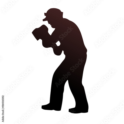 Silhouette of a person wearing a cap and holding a camera, seemingly taking a photograph.