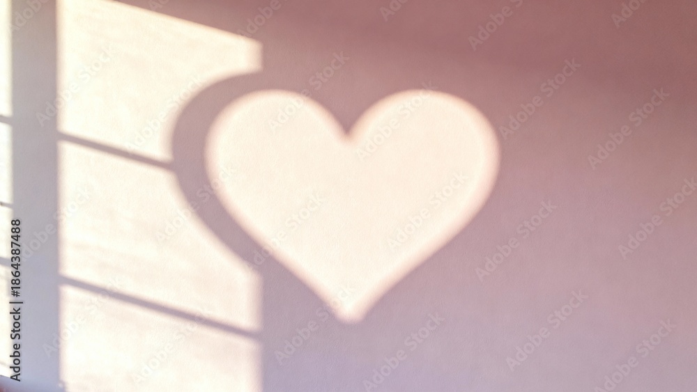Fototapeta premium Valentine's Day Background. Minimalist Pink Room with Love Symbol made of Light.