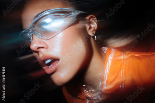 Woman wearing sunglasses enjoying Y2K nightclub fashion street style