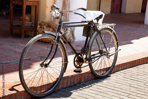 Wallpaper Mural Old bicycle parked on the street. Old rusty bicycle in the beautiful Heritage Town of Santa Cruz de Mompox. Torontodigital.ca
