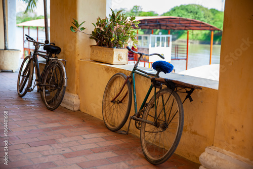 Wallpaper Mural Old bicycle parked on the street. Old rusty bicycle in the beautiful Heritage Town of Santa Cruz de Mompox. Torontodigital.ca