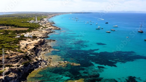Tableau sur toile Aerial view of the anchorage for yachts and beautiful beach of Ses Platjetes, in the Spanish Mediterranean island of Formentera