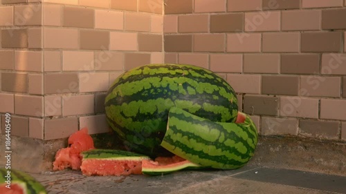 slow-motion of two watermelons smash together