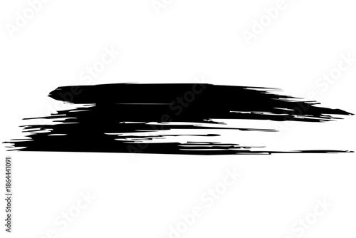 A black brush stroke isolated on a white background viewed from a straightforward perspective