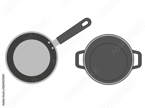 Overhead view of two kitchen cookware a frying pan and a pot with handles for cooking and culinary use