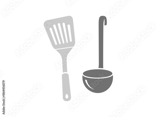 Kitchen utensils a spatula and ladle for cooking and serving, essential tools for every home cook