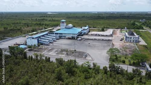 Wallpaper Mural Aerial view of the bus terminal in the gambut Banjarmasin, many buses parked there Torontodigital.ca