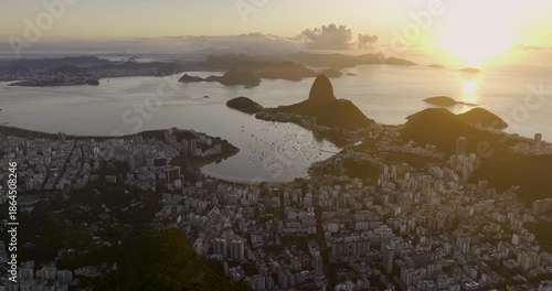 High angle panorama of Botafogo Bay and Sugar Loaf Mountain, Brazil. Aerial drone view at sunrise