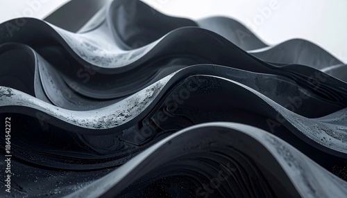Abstract, undulating, fluid-like form with smooth, dark surfaces and subtle texture