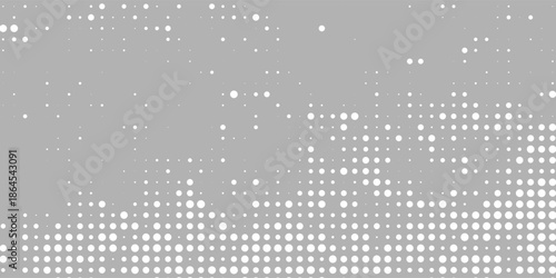 Abstract gray background featuring a modern halftone dot pattern with smooth gradient transitions