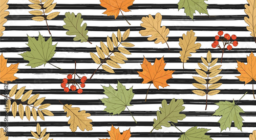 Seamless autumn pattern featuring colorful fall leaves like maple and oak over a black and white horizontal striped background.