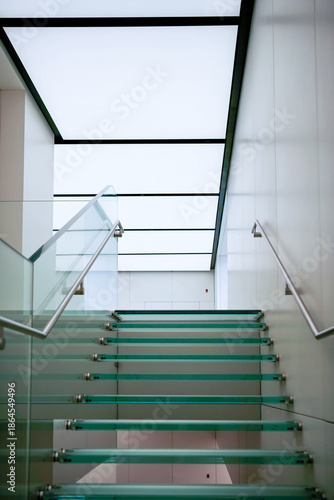 Modern Glass Staircase with Skylight Ceiling