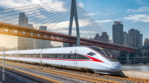 Schilderij op canvas High-speed Train Passing Under Modern Bridge