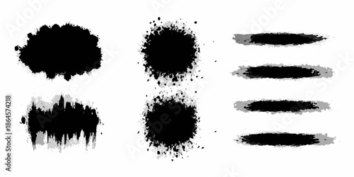 Abstract black ink splashes and brush strokes in varying shapes and intensities