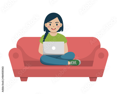 Young woman comfortably working on a laptop while sitting cross-legged on a sofa