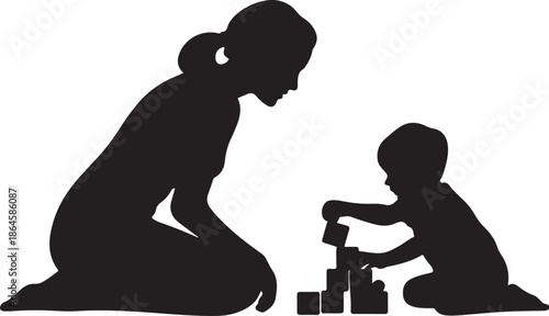 Silhouette of and child playing with blocks on floor