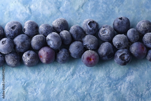 Chilled blueberries in a snowy forest setting