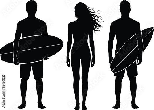 Silhouette of two male surfers holding surfboards and a woman with long flowing hair standing on beach during summer vacation