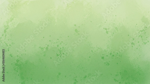 Soft green watercolor background with a speckled, diffused texture effect