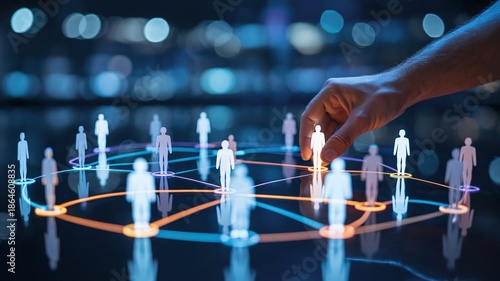 A hand interacts with a digital network of people icons on a dark background with glowing connections