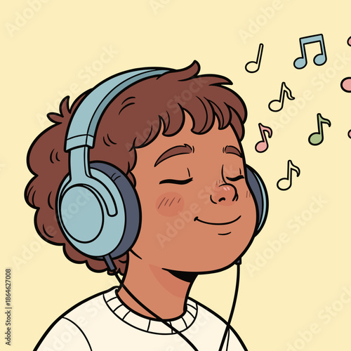 Happy child enjoying music with headphones on