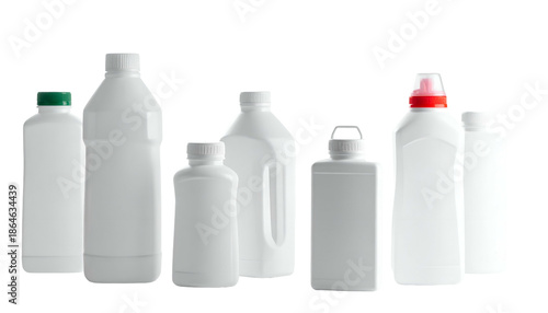 Assortment of white, plastic household cleaner bottles, various shapes and sizes, arranged against a stark black background