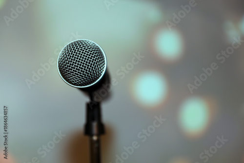Close-up microphones with blurred light background hall for Reporter reporting or public speaking or journalist interview or speech and broadcasting media live speech concept.