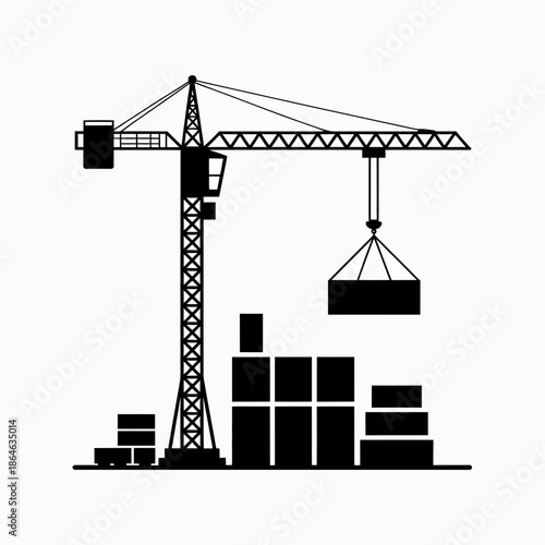Industrial tower crane operating, lifting heavy cargo at construction site
