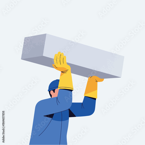 Man lifting a large concrete block.