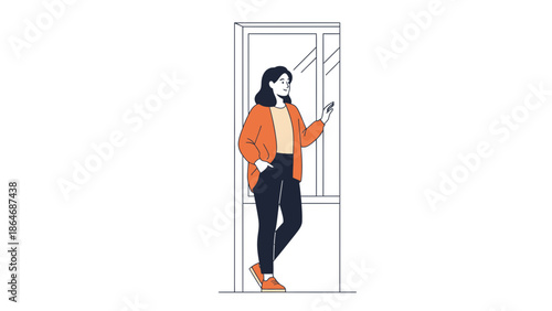 Stylish young woman standing by a door while using her smartphone in a modern interior scene