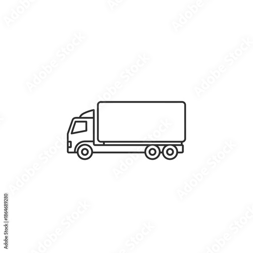 Large Delivery Truck Driving on Highway During Daylight