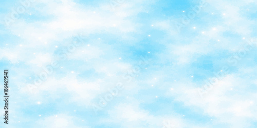 Abstract blue bokeh sky background with fluffy white clouds and bright natural light creating a beautiful summer atmosphere in the clear high heaven