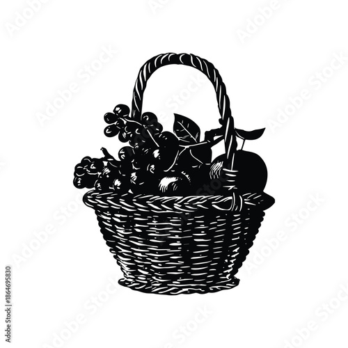 Wicker basket filled with fruits and grapes
