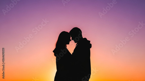 Silhouette of a couple embracing at sunset romantic moment against a vibrant sky symbolizing love and togetherness