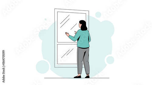 woman standing and reaching for window handle in a modern building with a clean minimalistic design