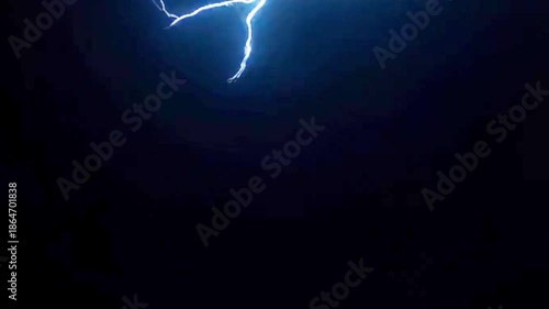 Blue huge thunder animation for winter rains and storms on black background overlay 4k footage, electric shock animation, energy background for titles & logos