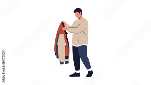 Young man choosing clothes from a wardrobe in a minimalistic room with a modern style