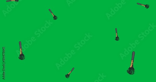 Digital animation of multiple makeup brush icons falling against black background